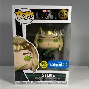 Funko Pop Sylvie Glow Figure with Green and Black